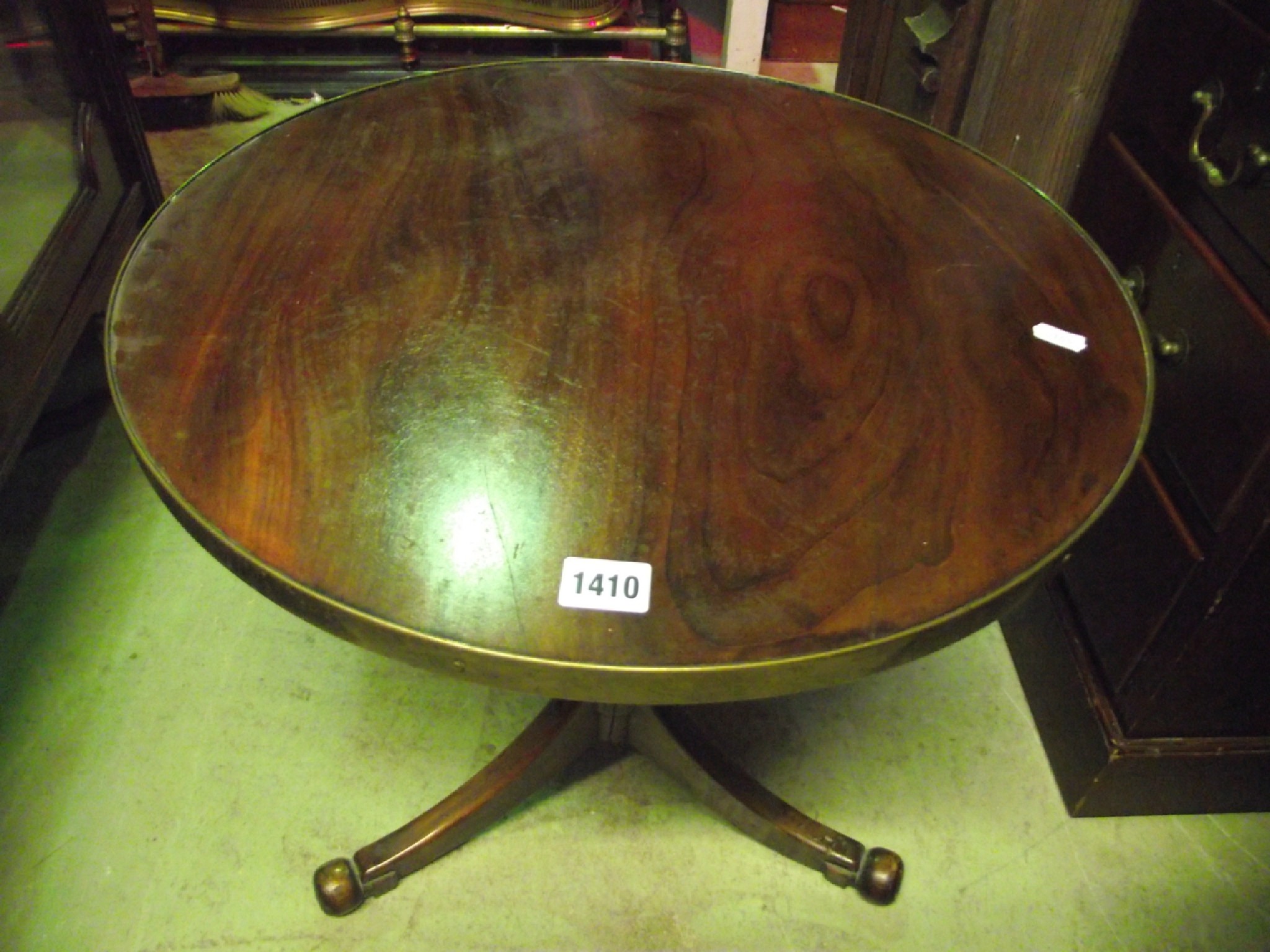 Appraisal: A th century mahogany occasional table the circular top with