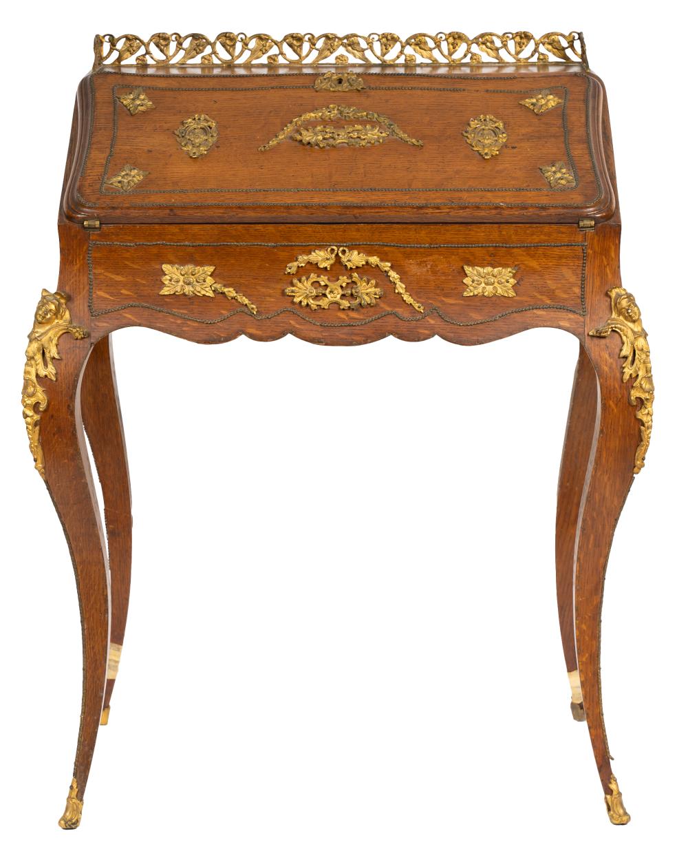 Appraisal: LOUIS XV STYLE GILT-METAL MOUNTED OAK BUREAUthe drop-front writing surface