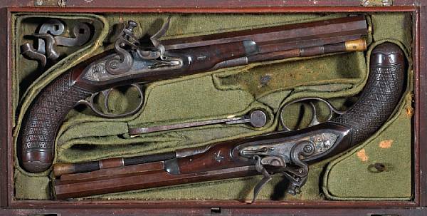 Appraisal: A cased pair of English flintlock duelling pistols by Durs