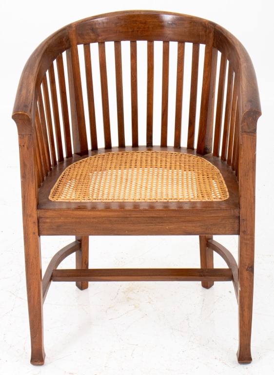 Appraisal: BRITISH ARTS AND CRAFTS STYLE BARREL CHAIR British Arts and