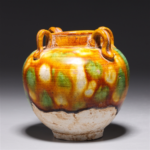 Appraisal: Chinese Tang dynasty sancai-glazed jar with four handles minor wear