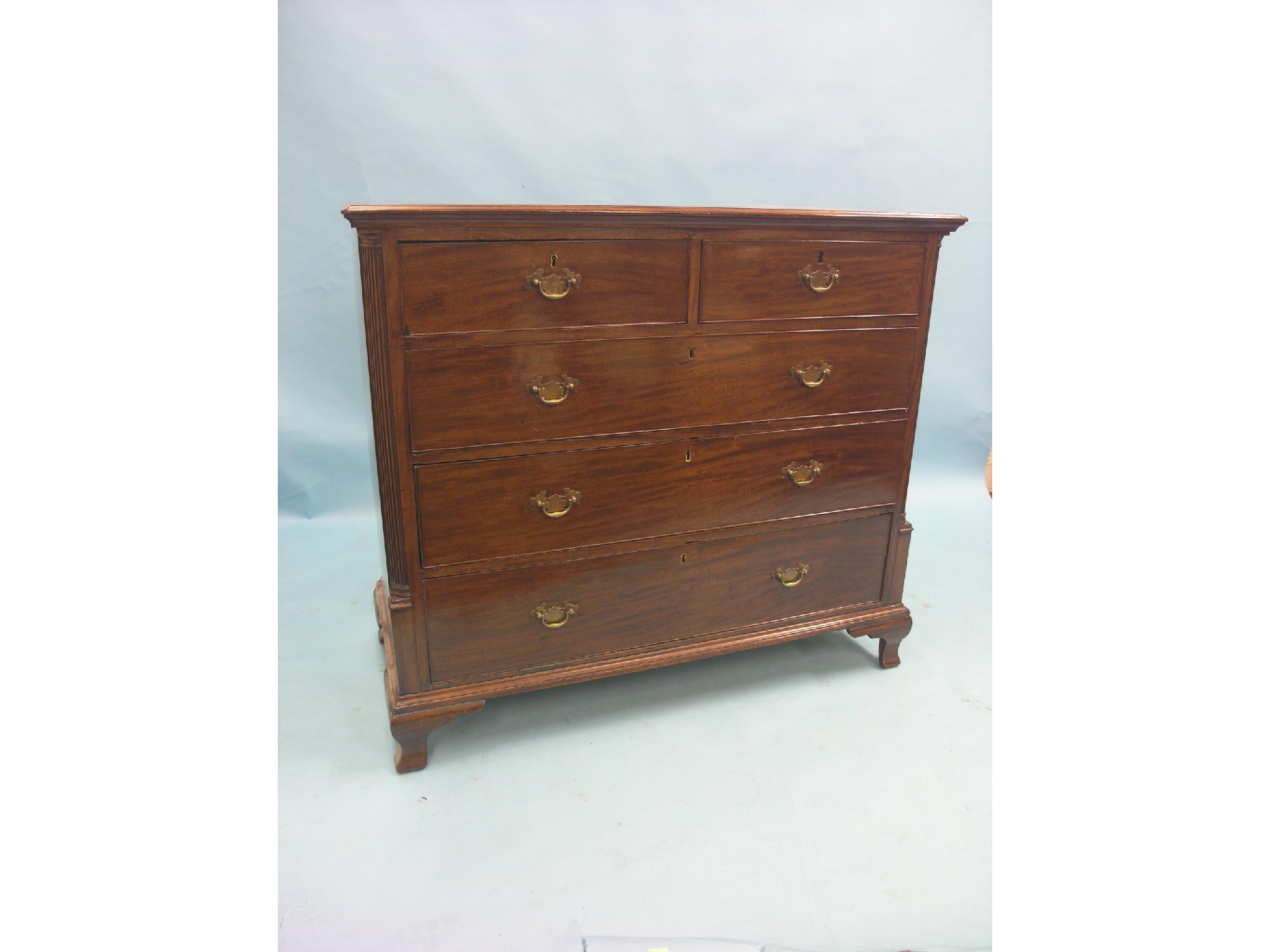 Appraisal: An early Victorian mahogany chest two short and three long