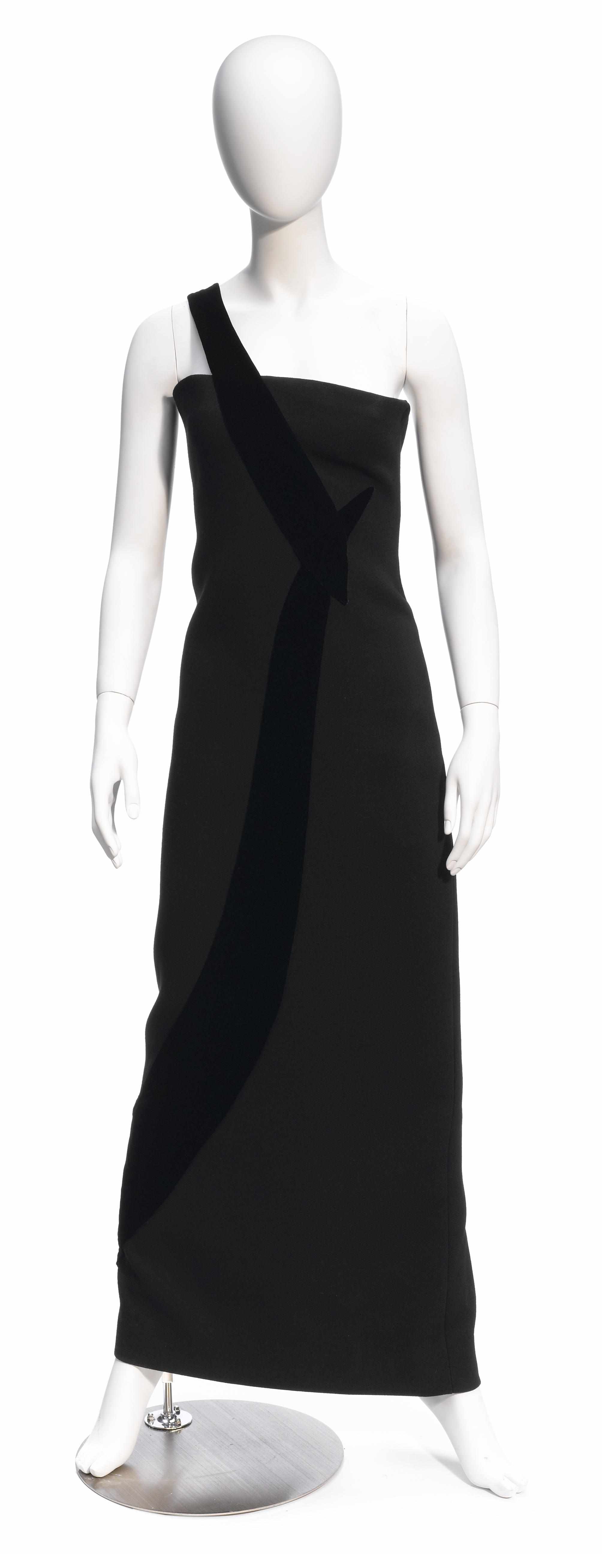 Appraisal: A Carolina Herrera long black dress with one velvet shoulder