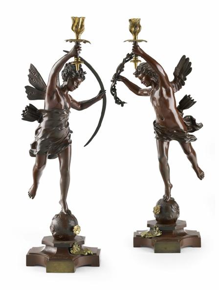 Appraisal: A pair of French late th century bronze candlesticks Signed