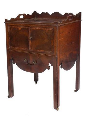 Appraisal: A GEORGIAN MAHOGANY TRAY TOP COMMODE with cupboard above a