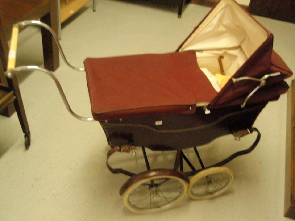 Appraisal: A Manton dolls pram and doll