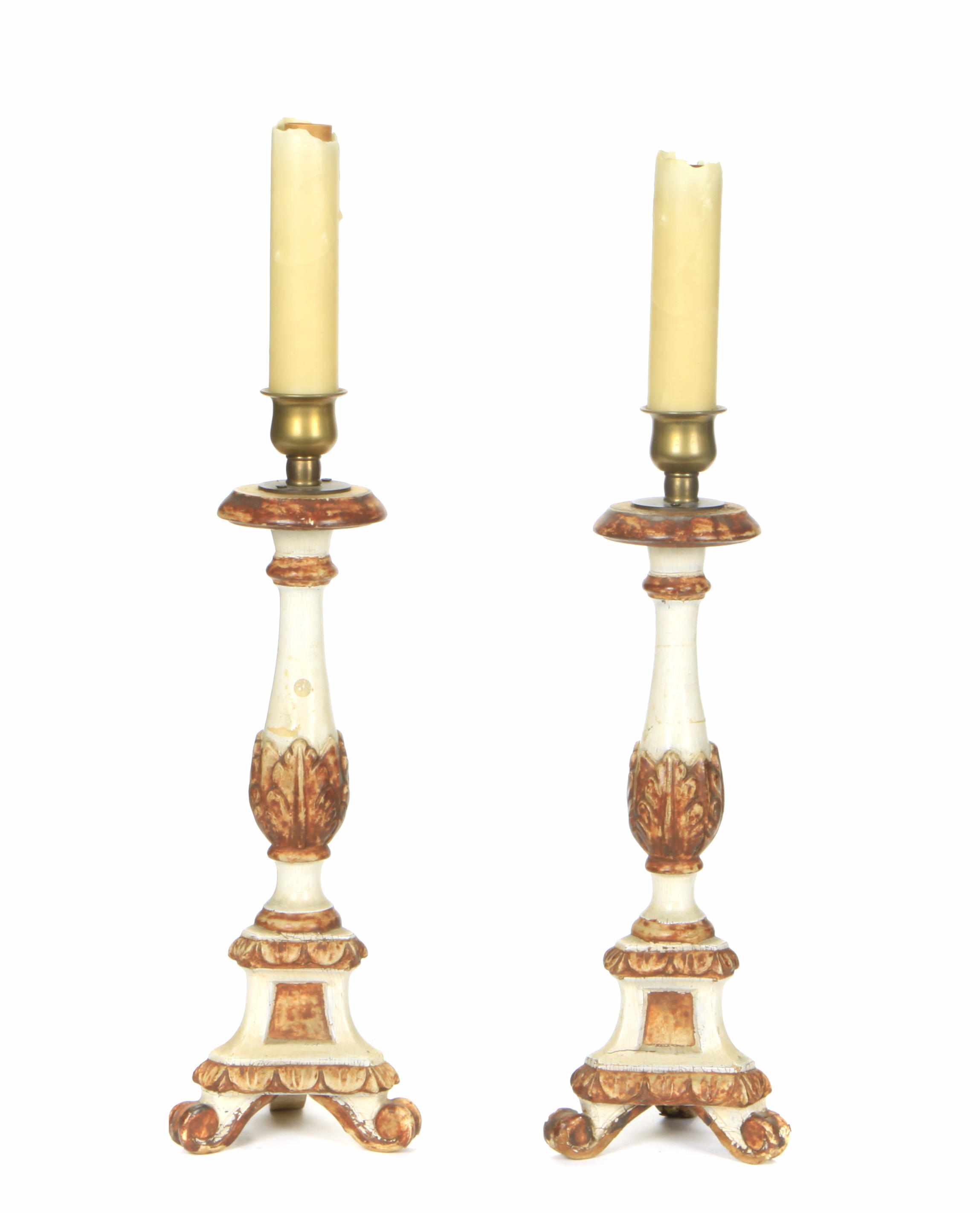 Appraisal: A pair of Baroque later decorated altar candlesticks now mounted