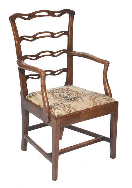 Appraisal: A GEORGE III OAK LADDER BACK ELBOW CHAIR with drop-in