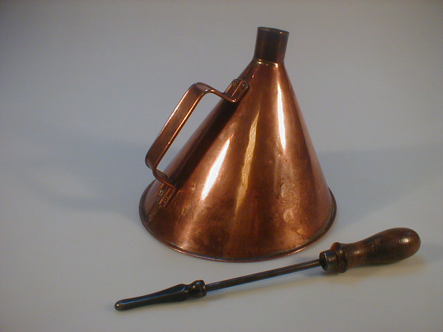 Appraisal: A copper ale muller with single handle high together with