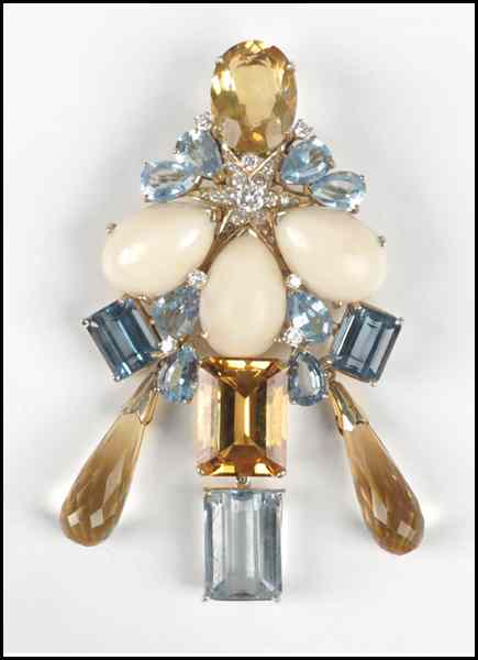 Appraisal: GOLD AND GEM SET BROOCH Comprised of blue topaz citrine