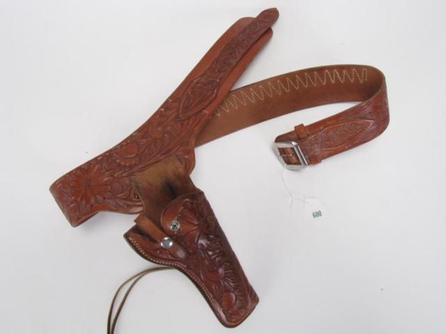 Appraisal: Tooled leather cowboy-style right-hand holster gun belt