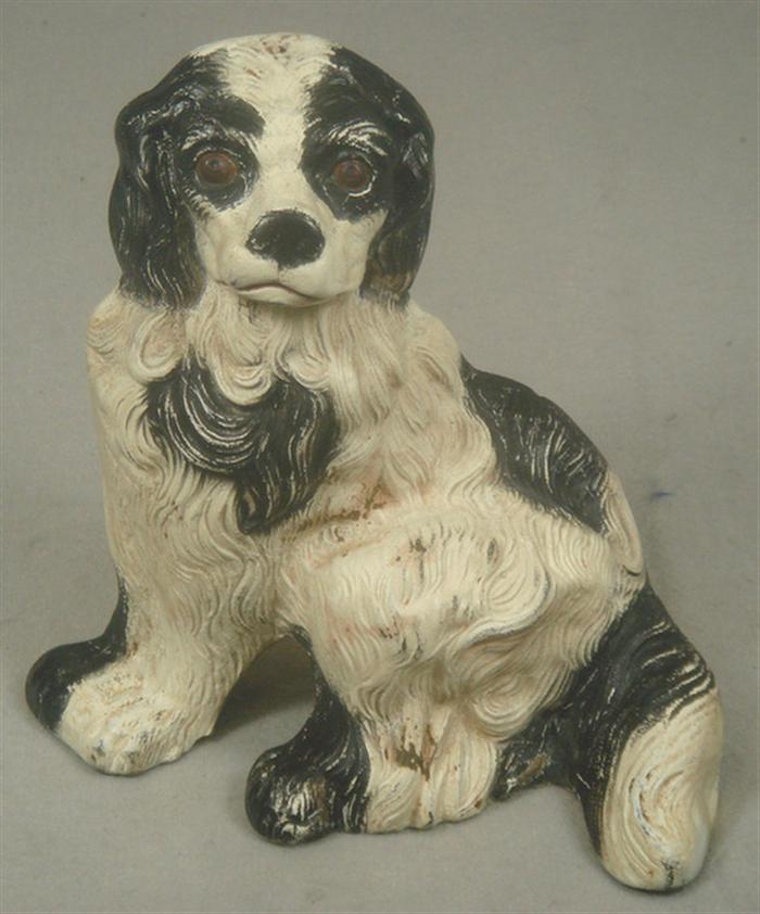 Appraisal: Cast iron doorstop free standing black and white Cocker Spaniel