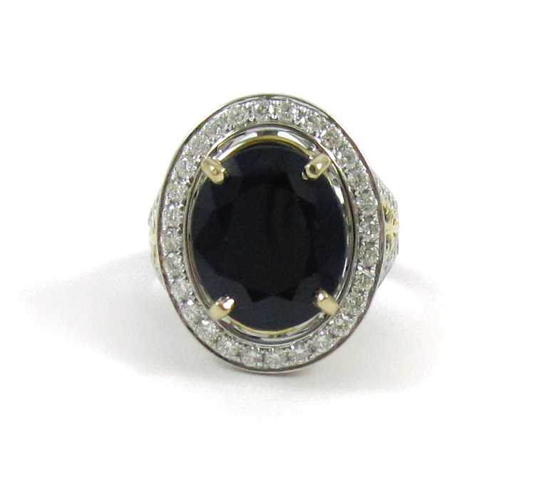 Appraisal: SAPPHIRE DIAMOND AND FOURTEEN KARAT GOLD RING The k white