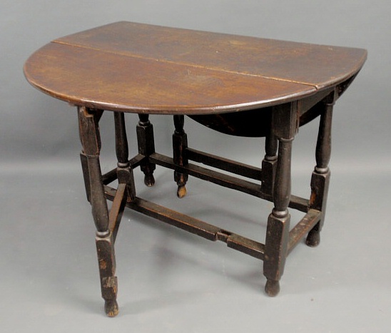 Appraisal: English oak gate-leg table th c h x l x