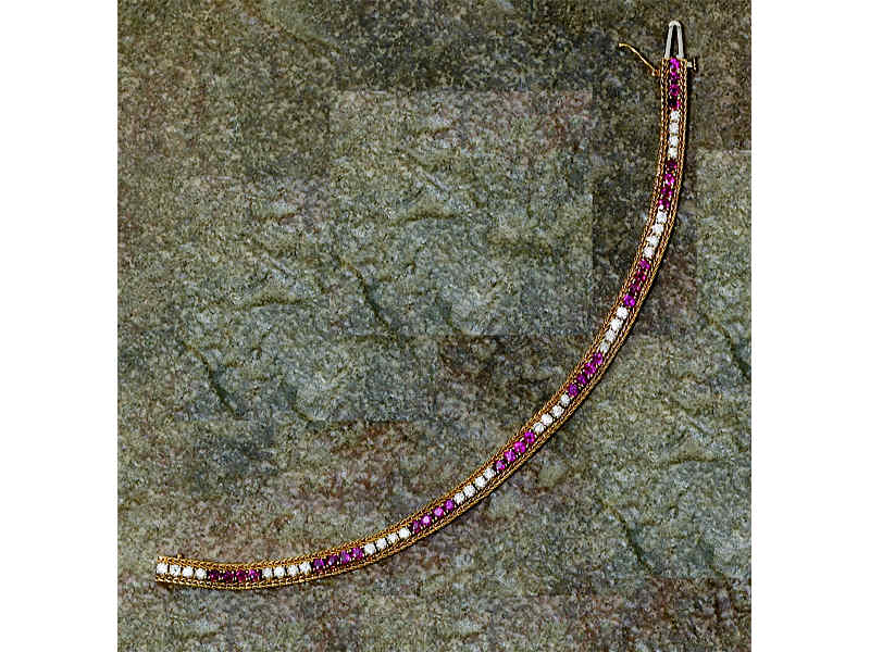 Appraisal: DIAMOND AND RUBY BRACELET k yellow gold set with thirty