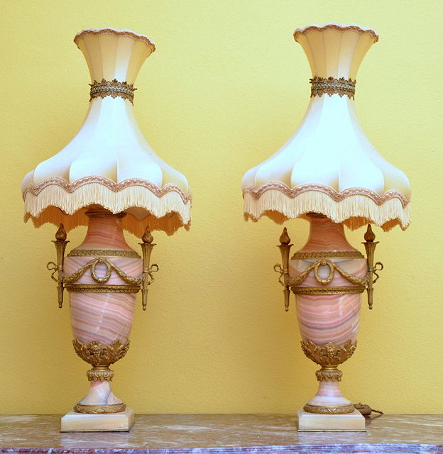 Appraisal: A PAIR OF MARBLE AND GILT METAL CLASSICAL STYLE LAMP