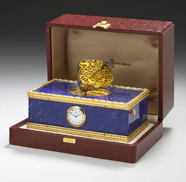 Appraisal: A Swiss gilt metal and enamel singing bird music box