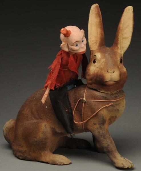 Appraisal: Large Paper Mache Rabbit Candy Container With Happy Hooligan riding