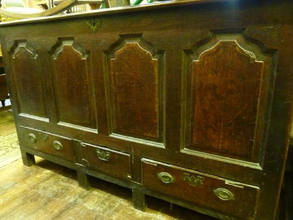 Appraisal: An th century oak mule chest with quarter fielded panelled