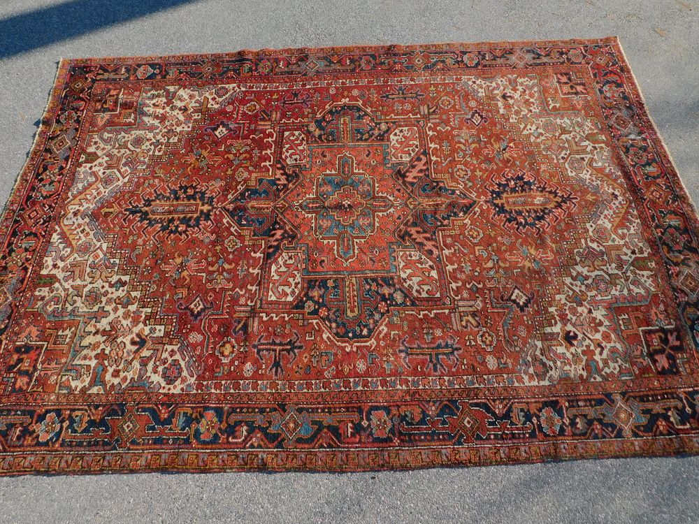 Appraisal: ANTIQUE HERIZ CARPET Semi-antique Heriz room size carpet ft by