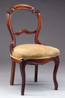 Appraisal: VICTORIAN WALNUT CARVED SIDE CHAIR Open back with carved grape