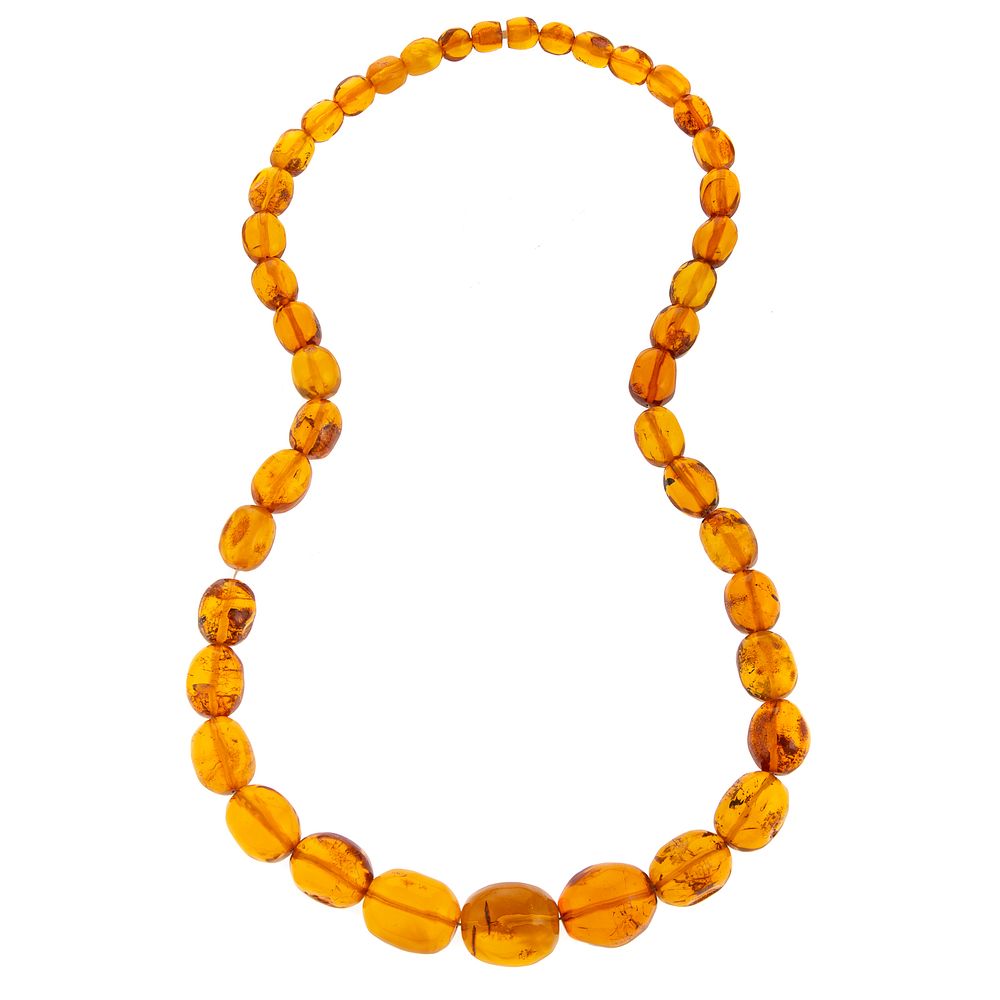 Appraisal: A Large Graduated Amber Necklace Amber necklace with graduated oval