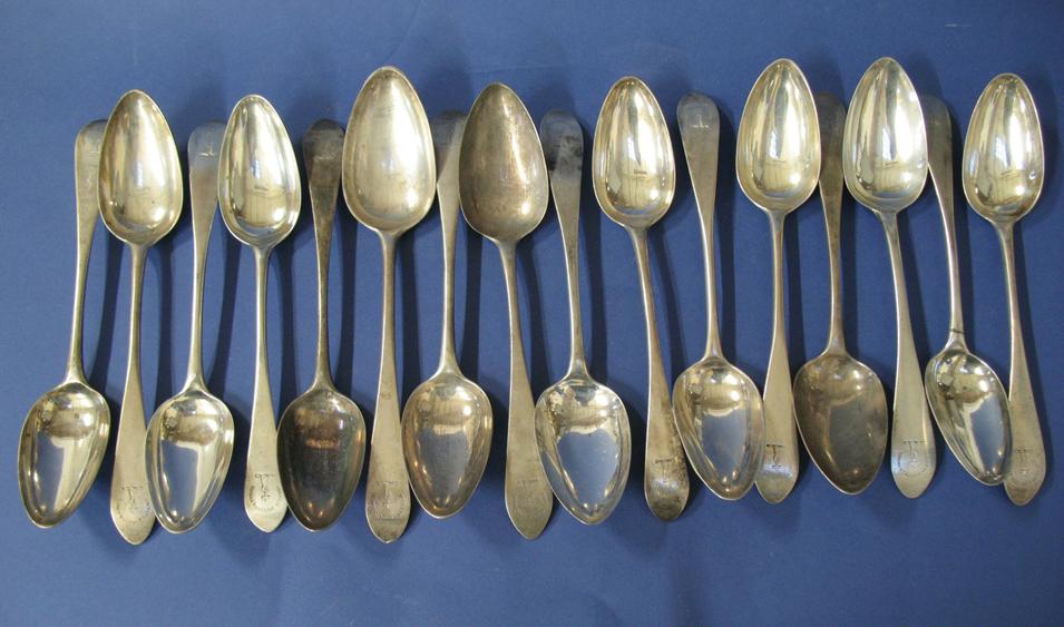 Appraisal: A HARLEQUIN SET OF TWELVE GEORGE III SCOTTISH TABLESPOONS with