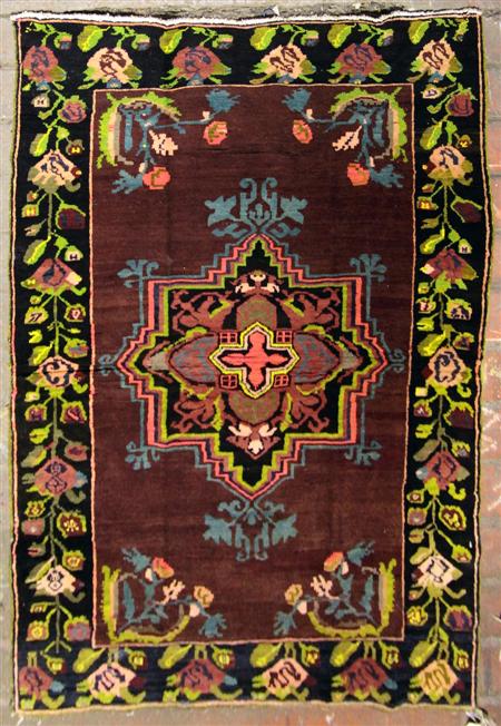 Appraisal: A Karabagh rug early th century the brown field with