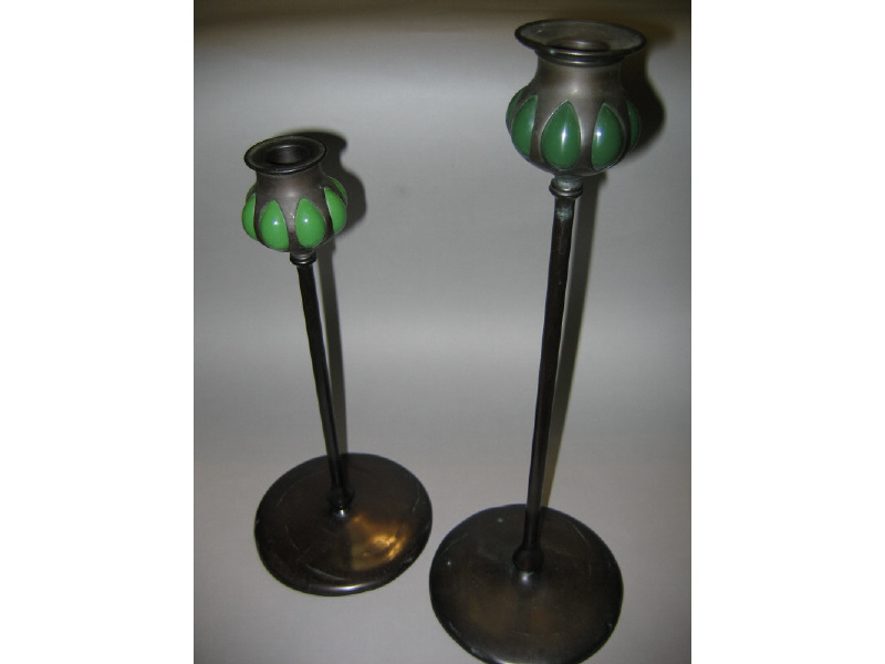 Appraisal: BUFFALO METAL WORKS PASADENA CALIFORNIA Two bronze candlesticks with green