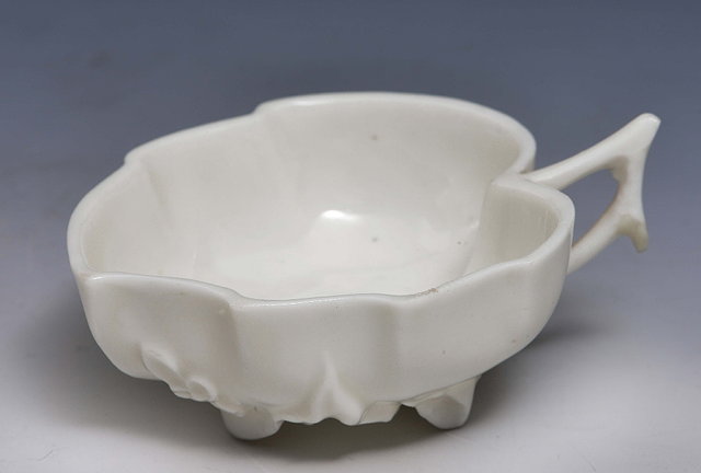 Appraisal: A CHINESE BLANC DE CHINE LEAF SHAPED CUP with twig