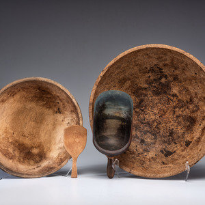 Appraisal: Two Turned Wood Dough Bowls with two wooden scoops Height