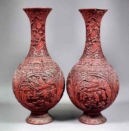 Appraisal: A pair of Chinese cinnabar lacquer baluster shaped vases each