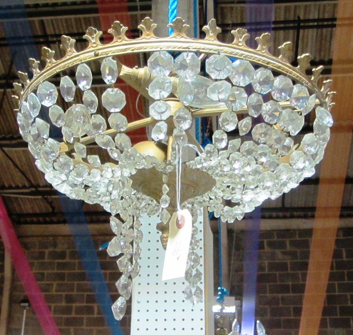 Appraisal: A gilt metal and glass bag chandelier