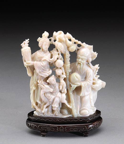 Appraisal: A carved opal figural group Depicting Shoulao with his tall