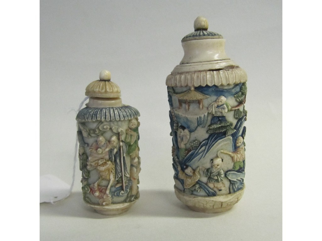 Appraisal: Two Chinese snuff bottles with carved and stained decoration