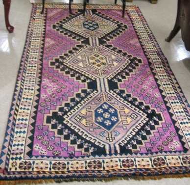 Appraisal: PERSIAN SHIRAZ AREA RUG a three geometric medallion design on