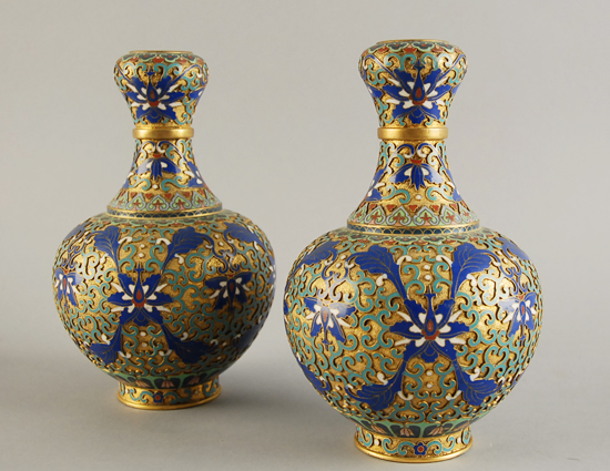 Appraisal: A Pair of Asian Cloisonne Vases made in a combination