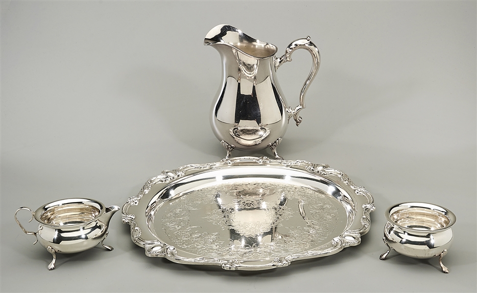 Appraisal: Four silver plate service items including a Wilcox serving platter