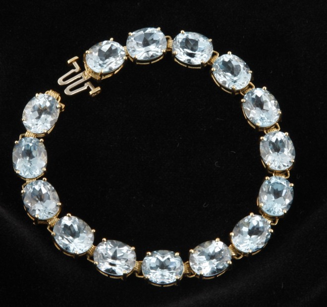 Appraisal: KY mm x mm oval blue topaz long S