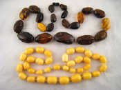 Appraisal: An amber necklace approx cm together with another necklace