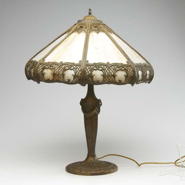 Appraisal: SLAG GLASS LAMP With white metal base and filigreed faceted