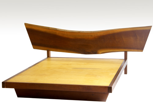 Appraisal: GEORGE NAKASHIMA Walnut full-size bed with free-edge headboard and platform