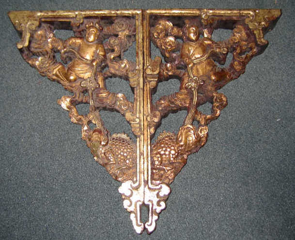 Appraisal: CHINESE CARVED AND GILT WOOD BRACKETS One side figural the