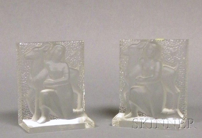 Appraisal: Verlys Colorless Art Glass Figural Bookends Carl Schmitz rectangular block