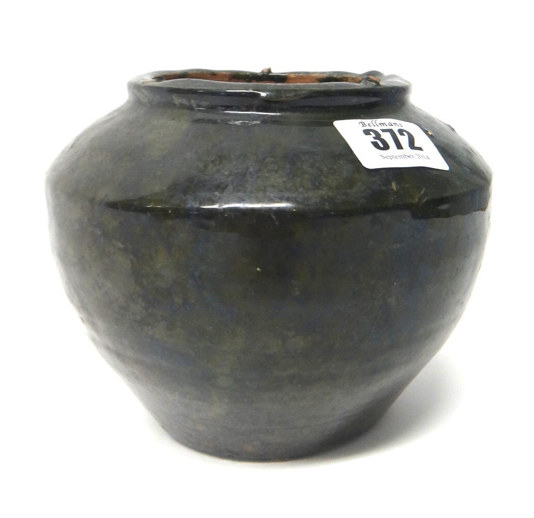 Appraisal: A small Chinese green glazed pottery jar Han Dynasty of