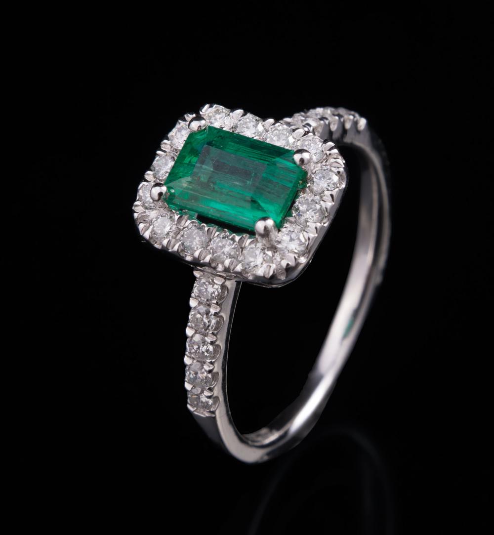 Appraisal: Platinum Emerald and Diamond Ring center prong set emerald cut