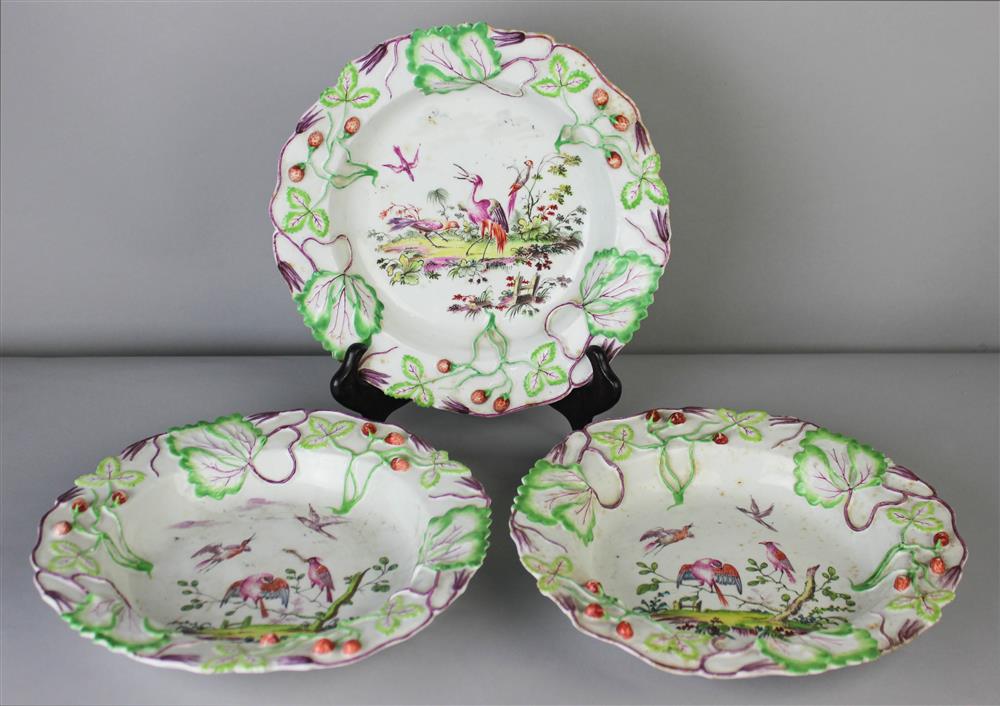 Appraisal: THREE LONGTON HALL STRAWBERRY LEAF MOLDED SOUP PLATES ca painted