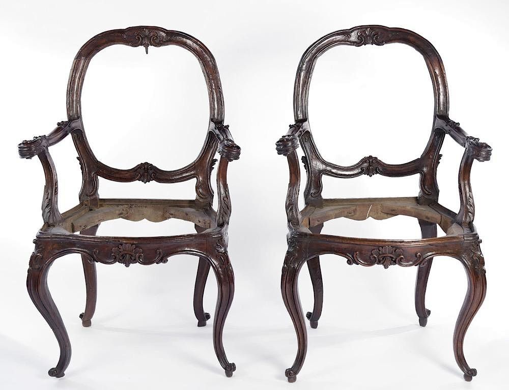 Appraisal: Pair Italian Walnut Armchairs Rococo thc Each with cartouche shaped