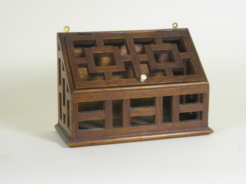 Appraisal: An oak Letter Box of open lattice type design and