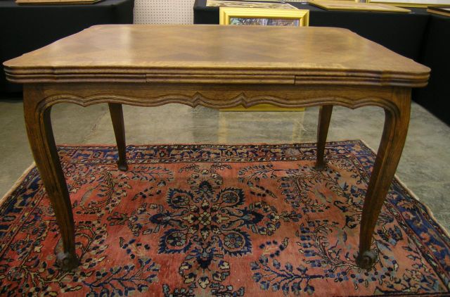 Appraisal: Oak Country French dining table with refractory leaves and diamond